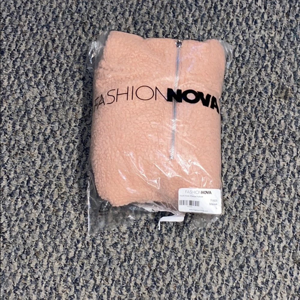 Cute Sherpa pullover jacket.
